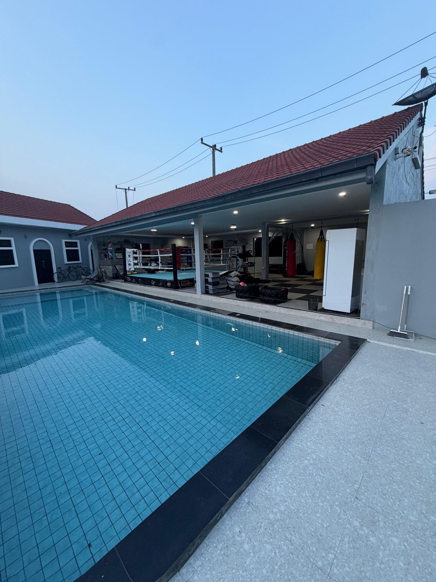 The pool beside the covered training area at the camp